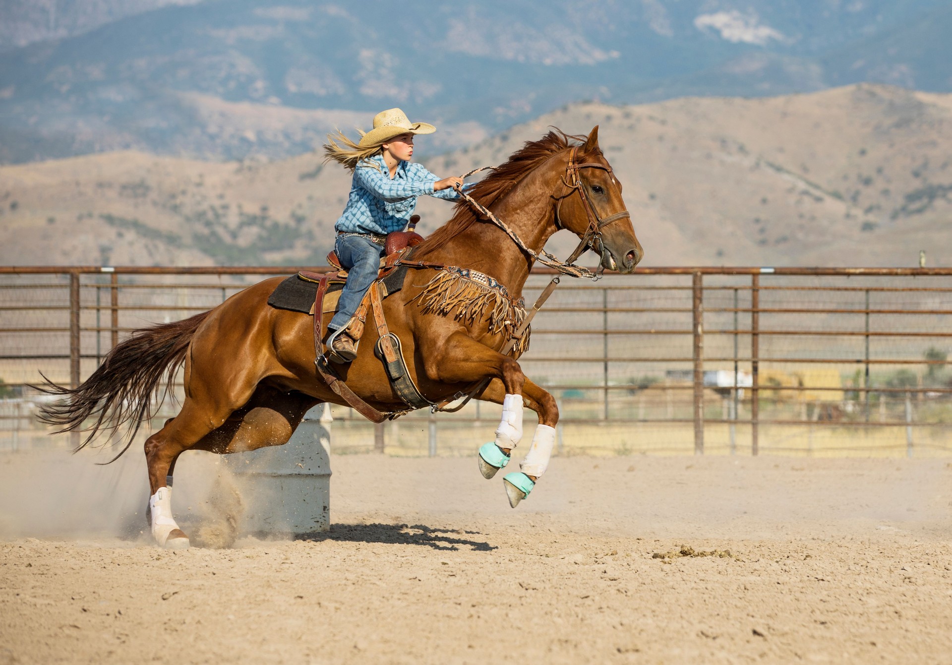 Young Cowgirl Barrel Racing